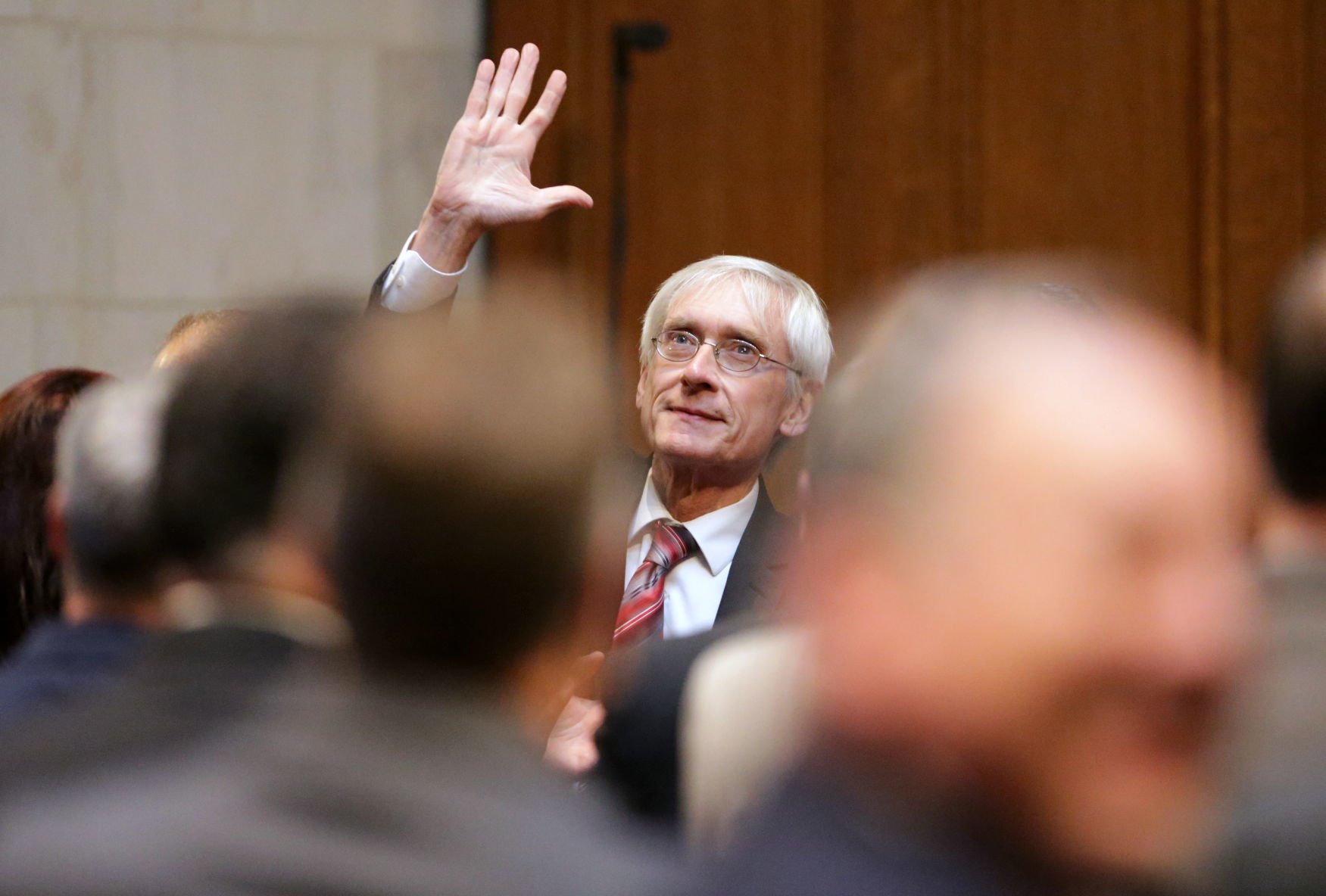 Scott Walker, Tony Evers disagree on budget priorities